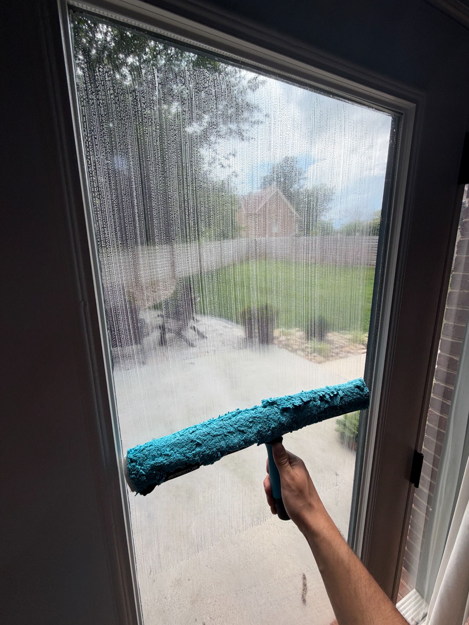 Door glass cleaning