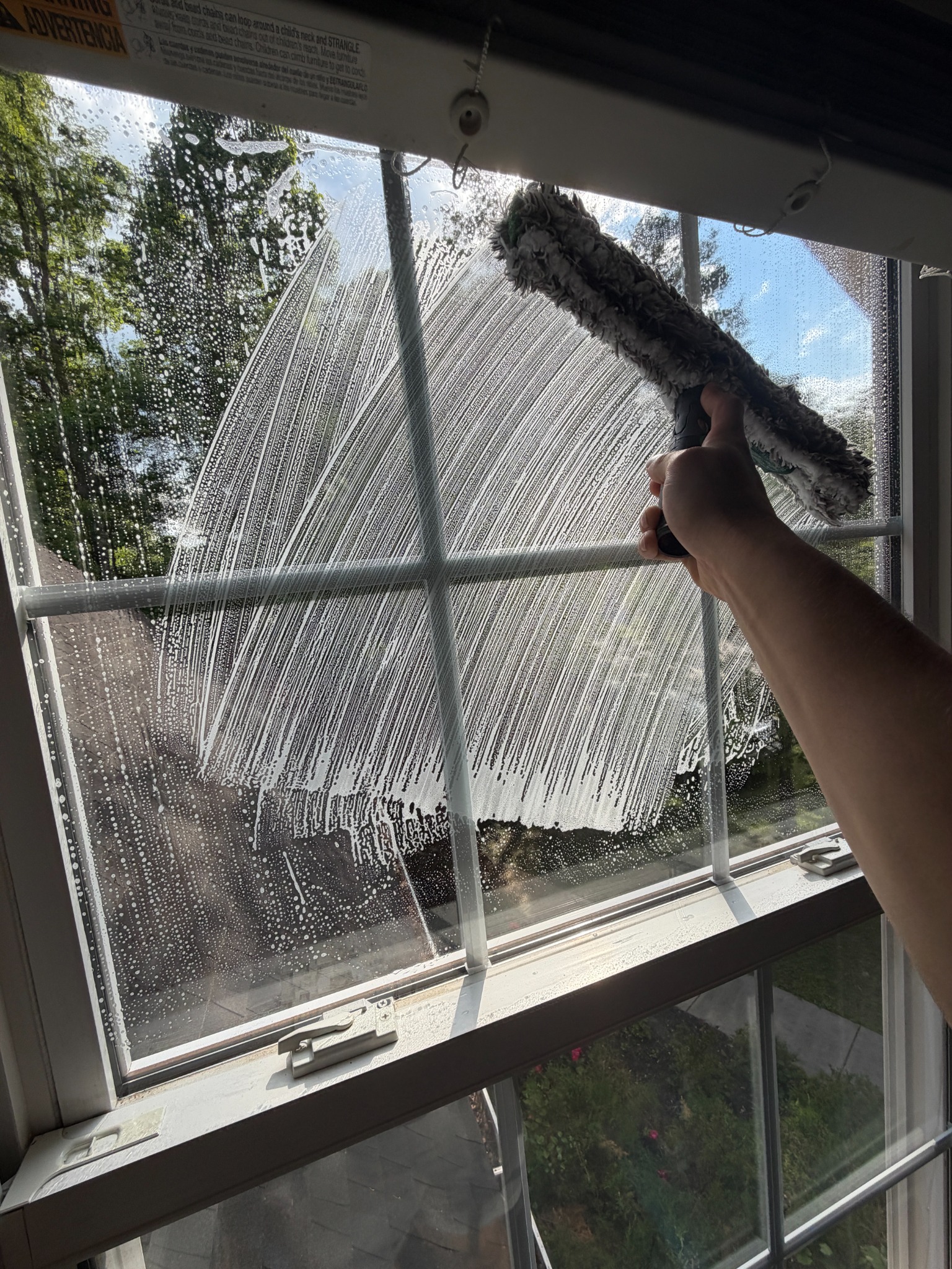 Interior window cleaning with mop