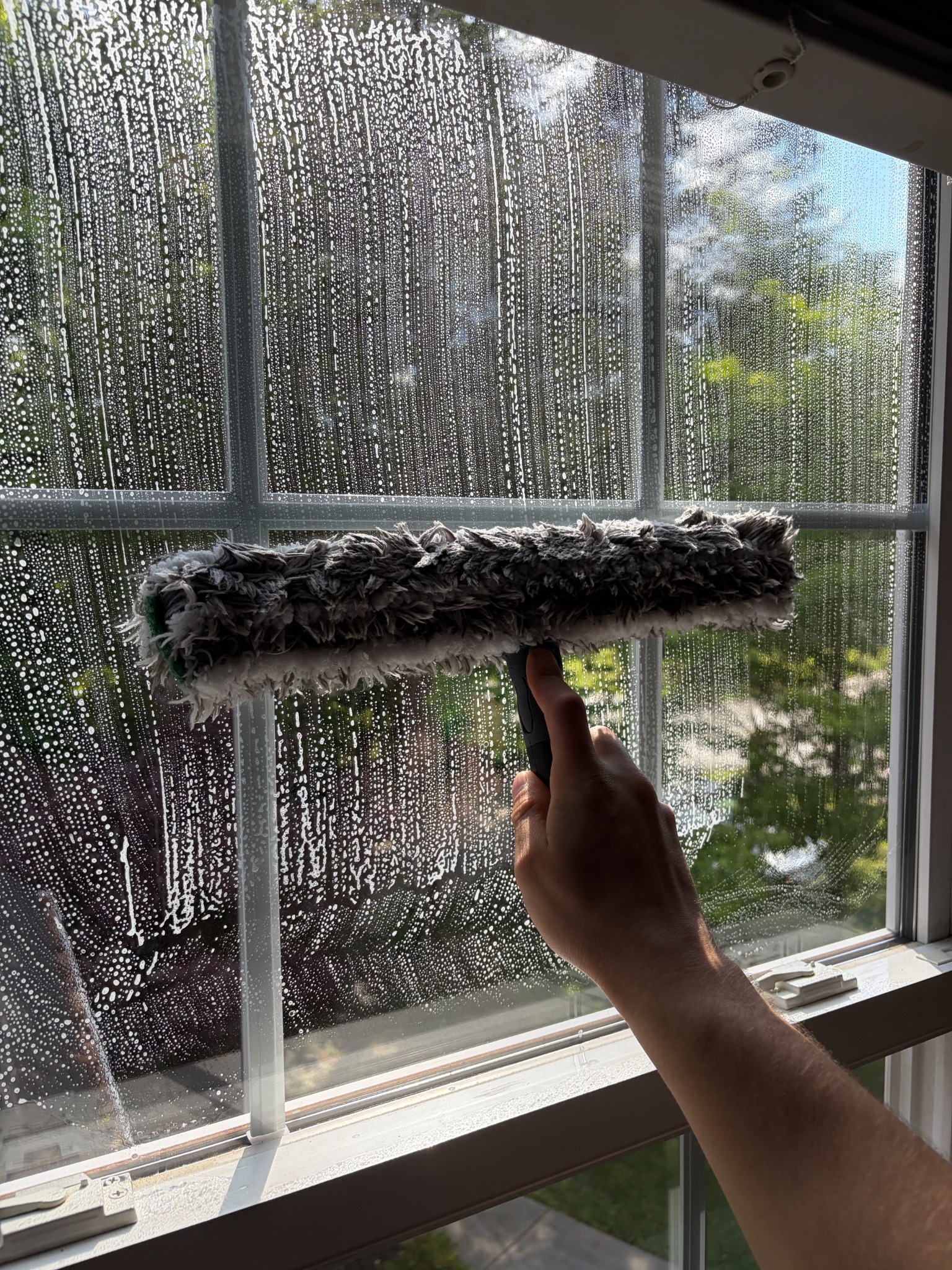 Interior window soap cleaning