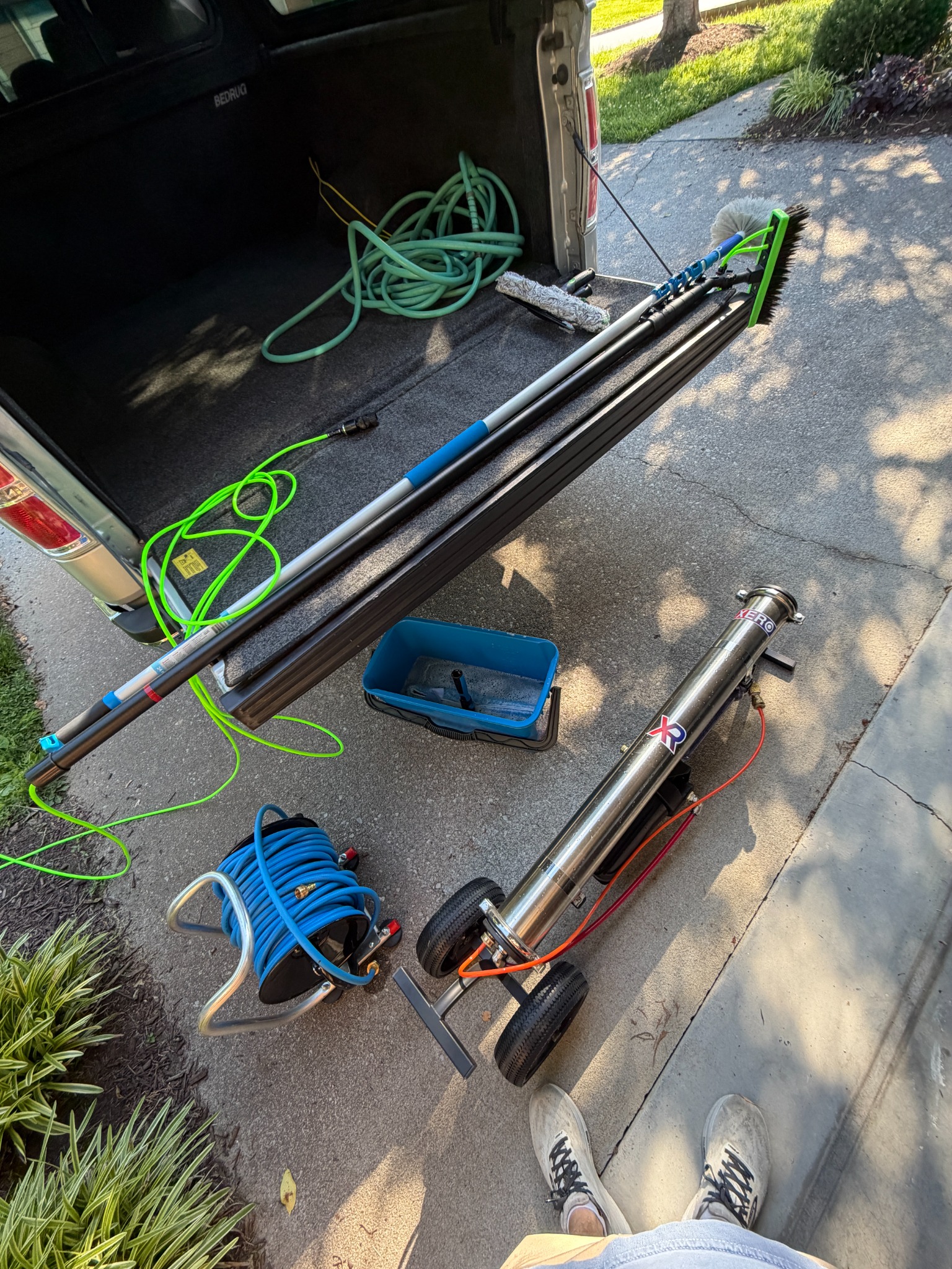 Professional window cleaning equipment laid out